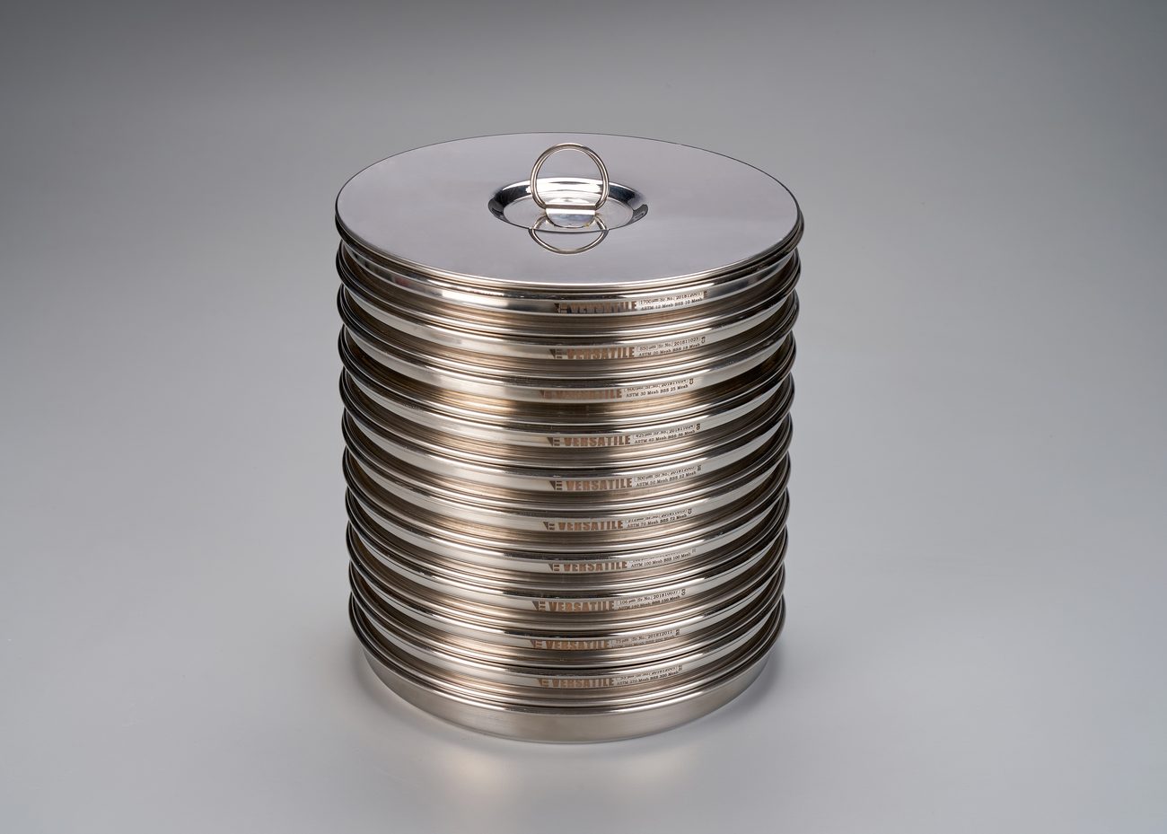 Complete column of Versatile test sieves capped with a lid