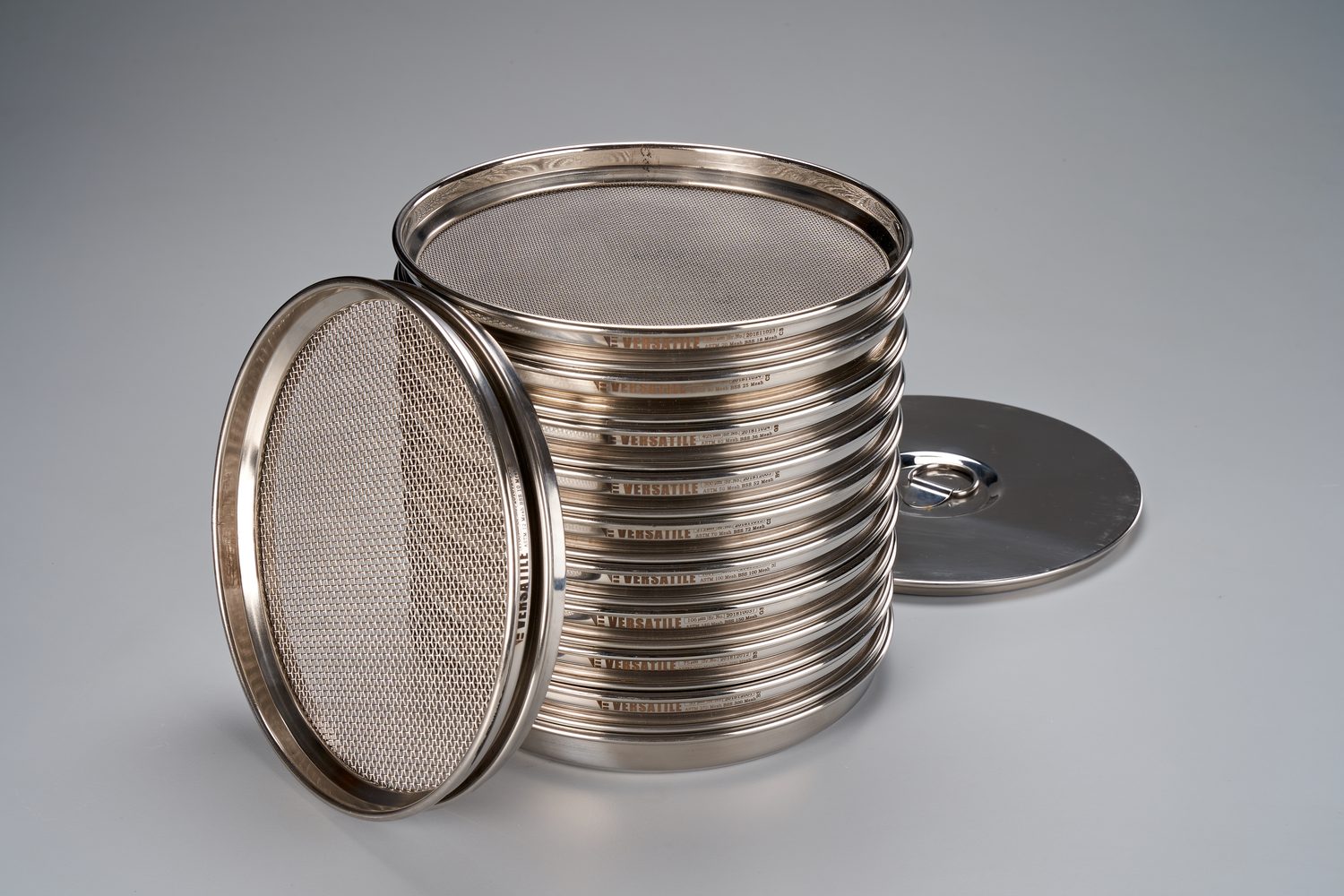Nest of Versatile full-height test sieves with lid and receiver